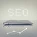 laptop ditutup dengan tulisan SEO di atasnya